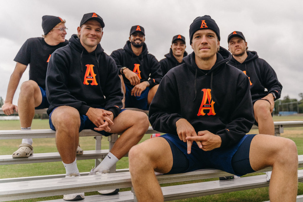 Amsterdam Flames players in Kit Drop hoodies on the bench