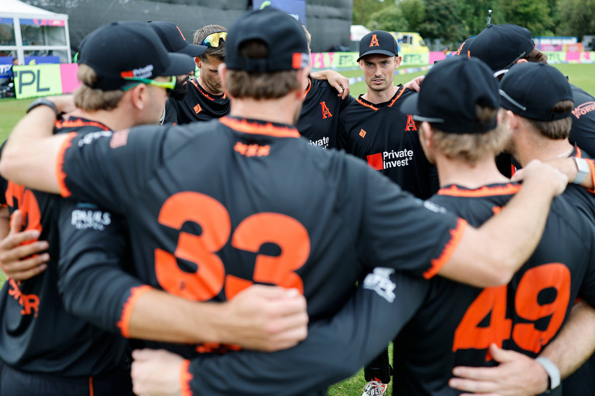 Amsterdam Flames players in a team huddle on match day